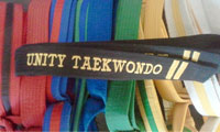 In taekwondo, belt color indicates the skill level of the wearer.